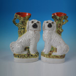 Pair Staffordshire pottery spaniel spill vases