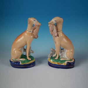 Pair Staffordshire Pottery whippets with hares