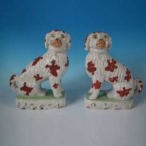 Pair Staffordshire Pipe Smoking Spaniels