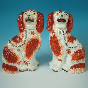 Pair Staffordshire russet & white spaniels