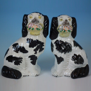 Pr Staffordshire Black and white flower basket spaniels