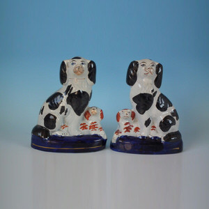 Pair Staffordshire spaniel&pups on cobalt bases