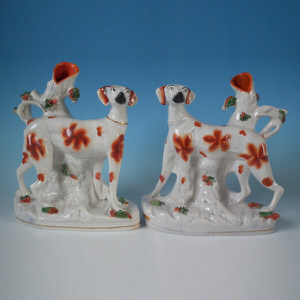 Pair Staffordshire foxhound spill vases