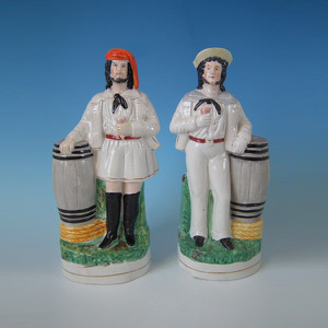 Pair Staffordshire sailor & barrel figures