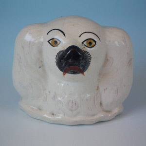 Staffordshire spaniel head money box