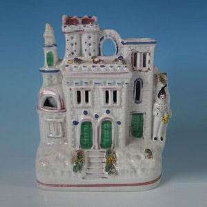 Staffordshire castle with drummer boy spill vase