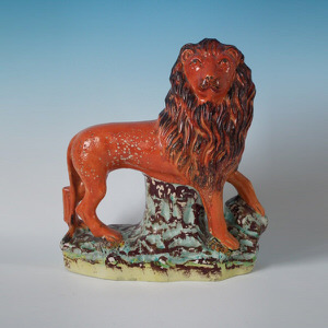 Large Staffordshire standing lion figure