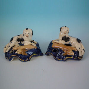Pair Staffordshire spaniels with hare inkwells