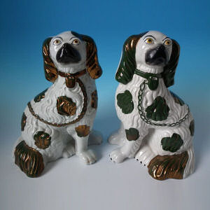 Pair Staffordshire copper lustre spaniels