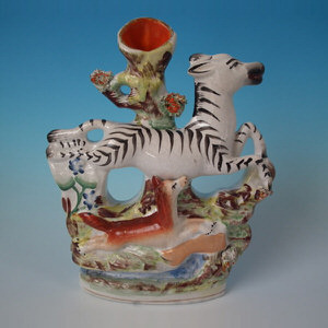 Staffordshire leaping zebra & fox spill vase