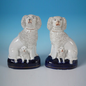 Pair Staffordshire poodle & pup figures