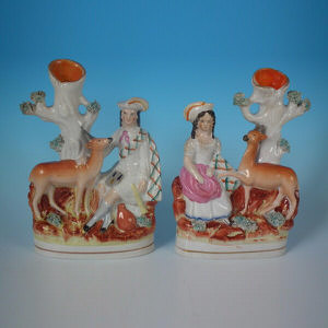 Pair Staffordshire Highland girls & boy with deer spill vases