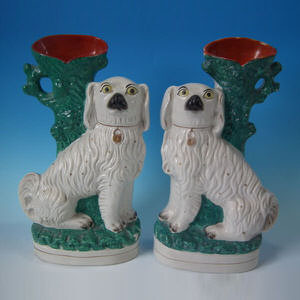 Pair Staffordshire spaniel spill vases