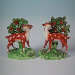 Pair Staffordshire deer with bocage figures