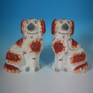 Pair Staffordshire russet & white spaniels