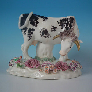 Staffordshire Porcellaneous cow spill vase