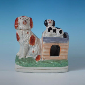 Staffordshire Spaniels with kennel figure group