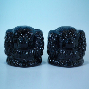 Pair Staffordshire Jackfield spaniel sash window stops