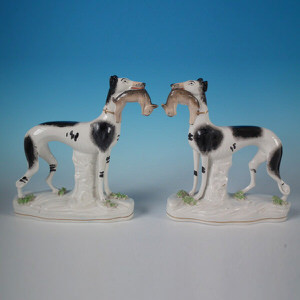 Pair Staffordshire black&white whippet figures