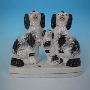 Staffordshire spaniels with pup inkwell