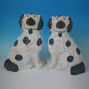 Pair Staffordshire chunky green lustre spaniels