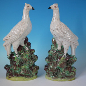 Pair Staffordshire bird on rocks figures