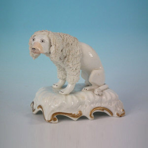 Staffordshire poodle on Rococo base figure