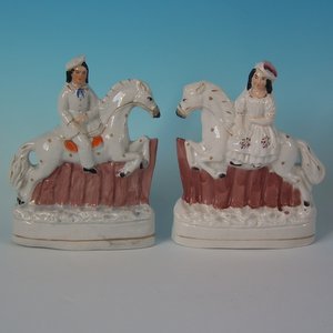 Pair Staffordshire Boy & Girl on Horses