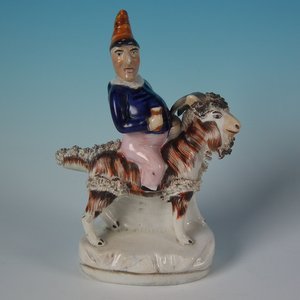 Staffordshire Pottery Punch on Goat Figure